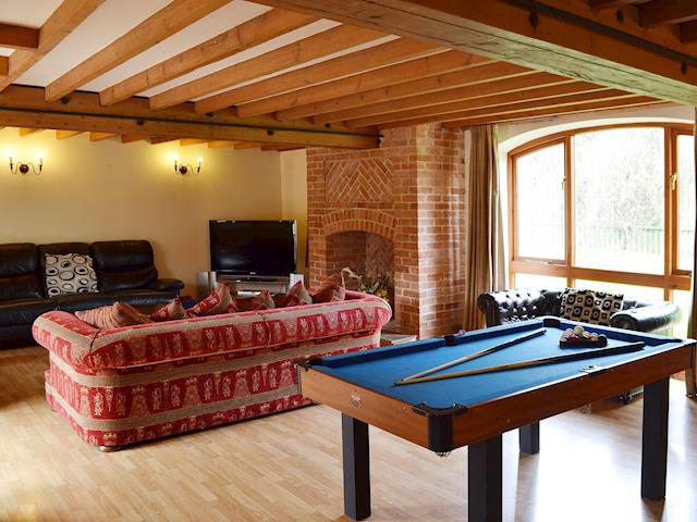 The light and airy living room also has a pool table | The Granary, Somersal Herbert, Ashbourne