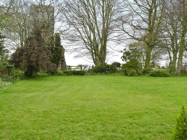 Garden, within the grounds of the Grade II listed ruins of West Caister Parish Church | Glebe Cottage, West Caister, near Great Yarmouth