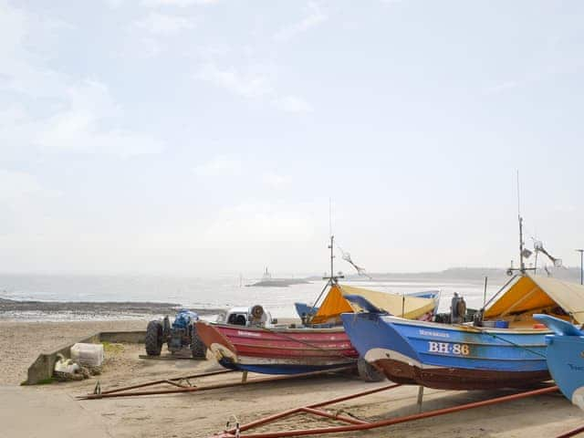 Newbiggin fishing boats and coast