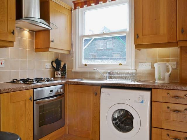 The kitchen is well organised and has lovely wooden units | Fellside - Royal Oak House, Keswick