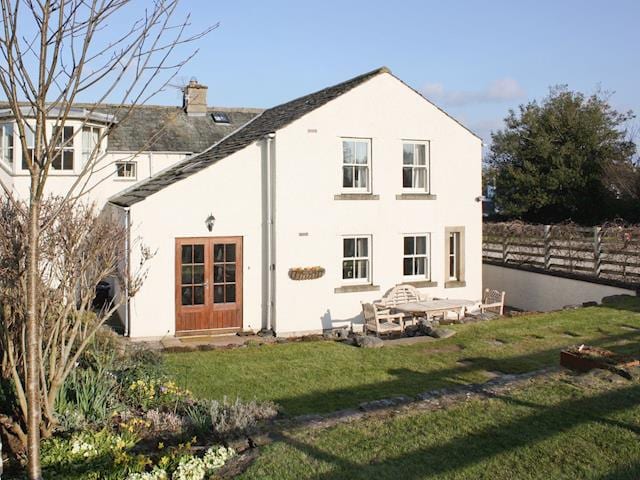 Terraced rear garden with outdoor furniture | Wordsworth Cottage, Sockbridge, near Ullswater