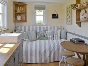 Cosy living area | The Blue Texel - West Hale Shepherd&rsquo;s Huts, Burton Fleming, near Filey