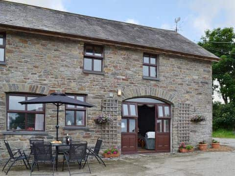 Stone built farmhouse on a large working sheep farm | Ty Coch Cottage, Near Aberaeron