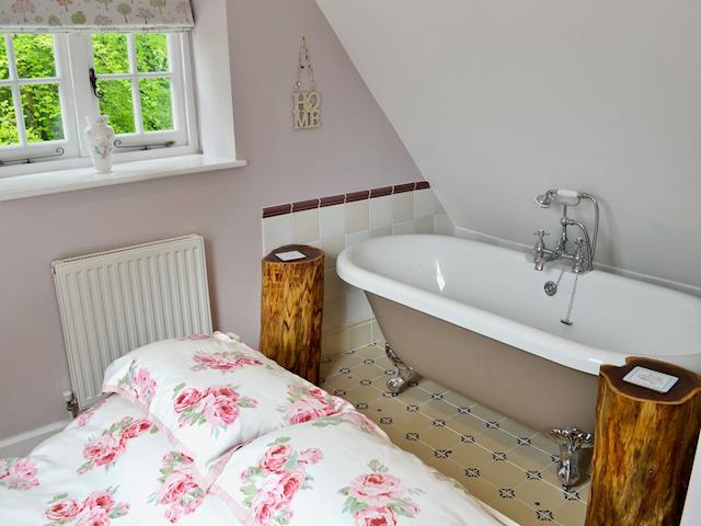 Double bedroom with roll-top bath and en-suite | The Coach House @ The Old Rectory, Buckland St Mary, near Chard