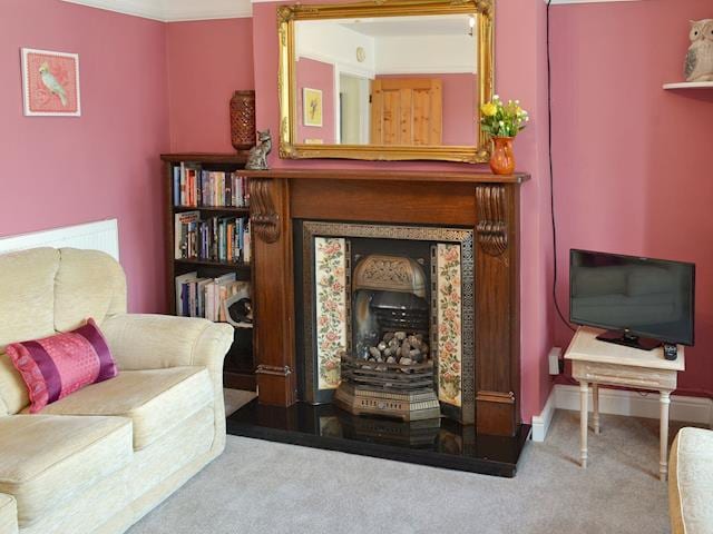 Feature fireplace in living room | Sea Folly, Brightlingsea