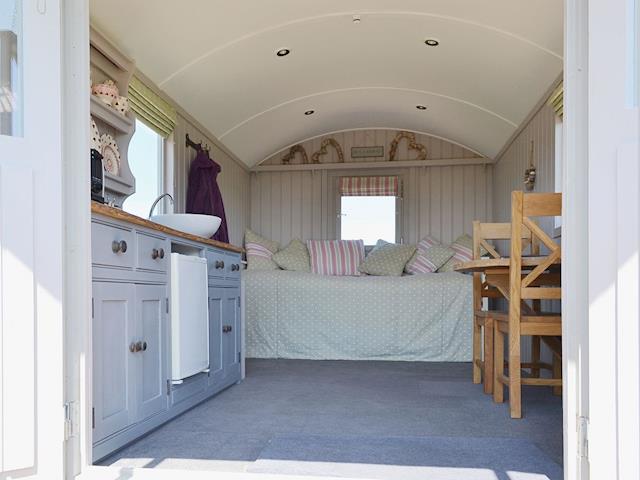 Modest open living area | The Lincoln Longwool - West Hale Shepherd&rsquo;s Huts, Burton Fleming, near Filey