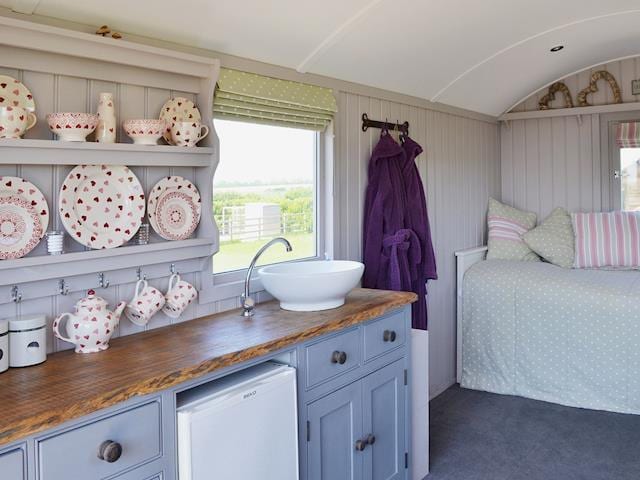 Delightful kitchen area with Emma Bridgewater crockery | The Lincoln Longwool - West Hale Shepherd&rsquo;s Huts, Burton Fleming, near Filey