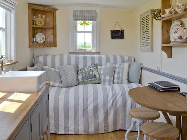 Cosy living area | The Blue Texel - West Hale Shepherd&rsquo;s Huts, Burton Fleming, near Filey