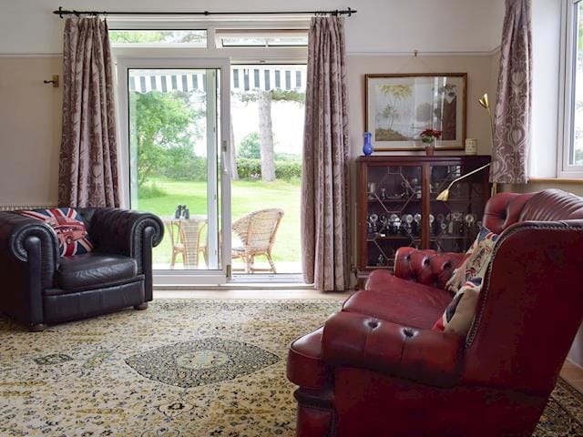 Spacious living room with French doors to garden | Bella Vista, Ryde