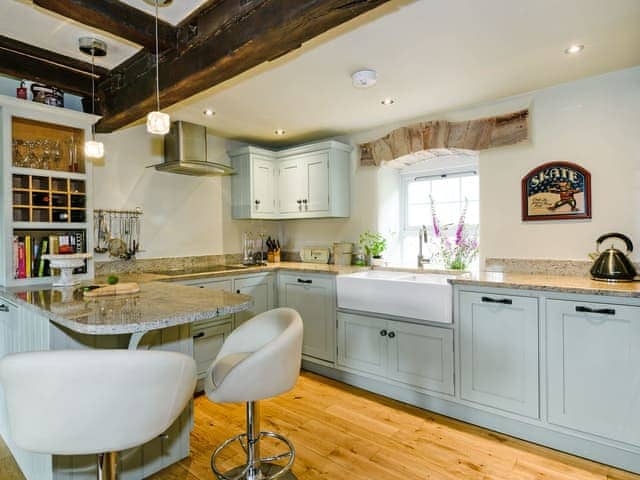 Designer kitchen with breakfast bar | The Old Mill, Great Strickland near Penrith