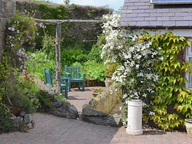 Delightful secluded sitting out area | Etive Cottage, Warenford, near Belford