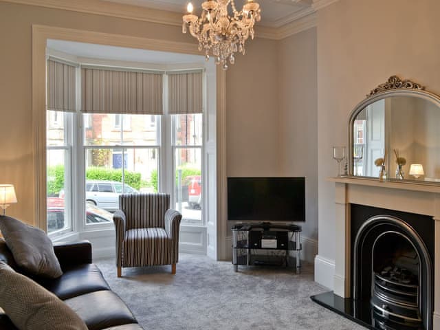 Grand living room with large bay windows | Abbeydale Town House, Whitby