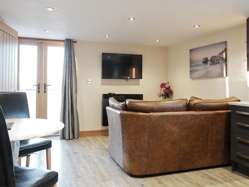 Stylish open-plan living area | Dreamcatcher - Wooldown Holiday Cottages, Marhamchurch, near Bude