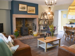 Lounge area with wood burner | Rose Cottage, Beadnell