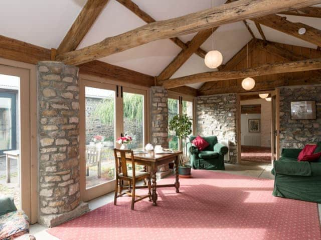 Additional sitting room with French doors to patio | Cowdber Barn, Burrow, Kirkby Lonsdale