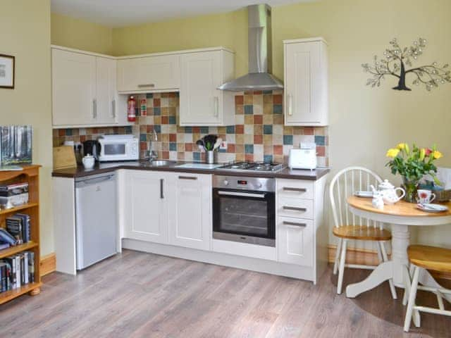 Well-equipped kitchen in open-plan living space | Fir Tree Cottage - Border Forest Cottages, Cottonshopeburnfoot, near Otterburn