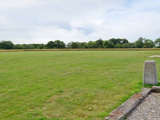 Open grassed recreation area | Fox&rsquo;s Den - Manor Farm Barns, Witton, near Happisburgh