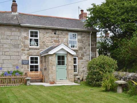 Long, enclosed and lawned front garden with patio | Sunloch Cottage, Tregaseal, near St Just