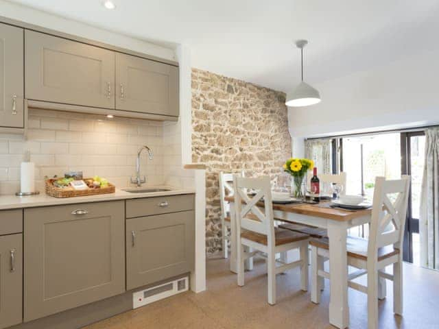 Dining area adjoins kitchen | Torfield - Lower Elsford Farm, Lustleigh, near Bovey Tracey