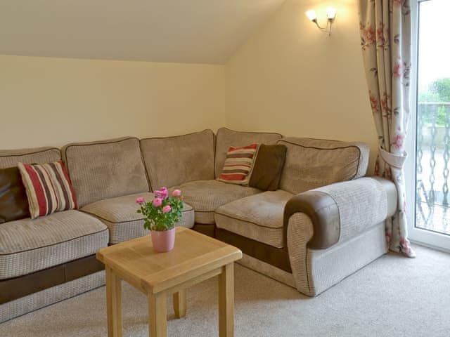 Comfy corner sofa | Hare Lodge - Copper Penny Apartments, Chipshop, near Tavistock