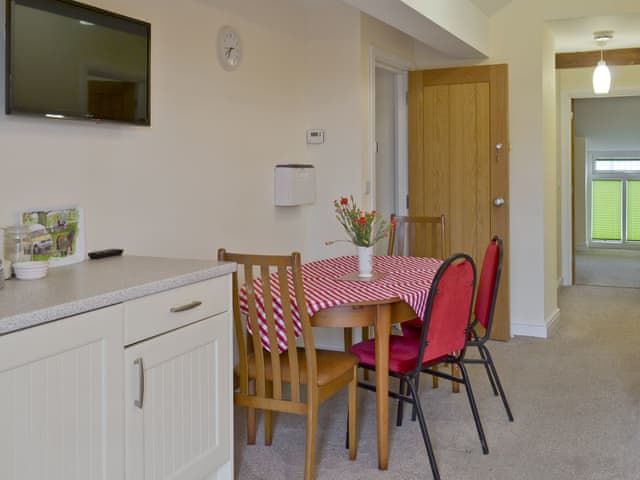 Convenient dining area | Hare Lodge - Copper Penny Apartments, Chipshop, near Tavistock