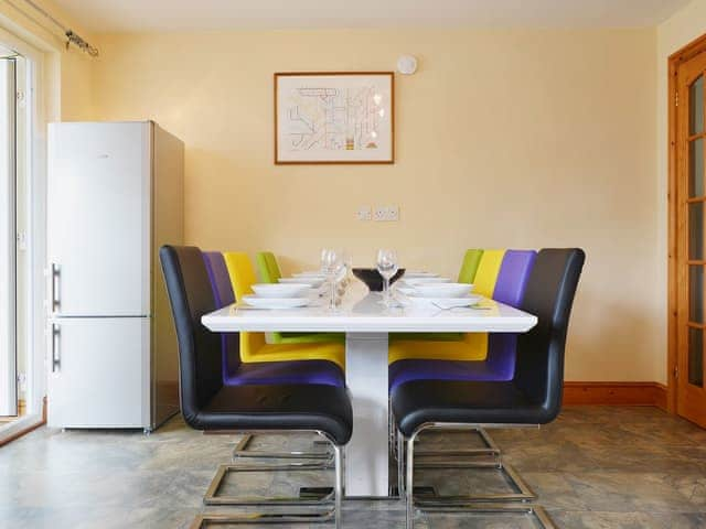 Contemporary dining table and access to conservatory | Briar Rigg, Keswick