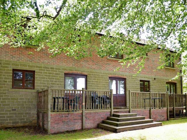 Rear view and terrace of holiday home | Farwell Cottage - Knockerdown Cottages, Carsington, near Ashbourne