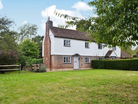 Timber-framed former farm workers cottage | Little Birketts Cottage, Holmbury St Mary, near Dorking