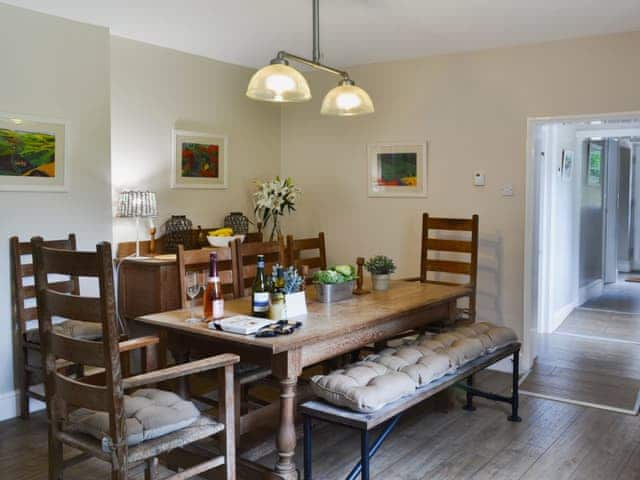 Dining room with welcome pack | The Garden Cottage - Thorpe Hall Cottages, Rudston, near Bridlington