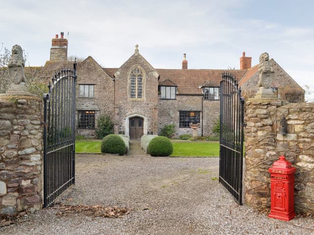Grand entrance to an outstanding holiday home | The Old Manor, Dunster, near Minehead