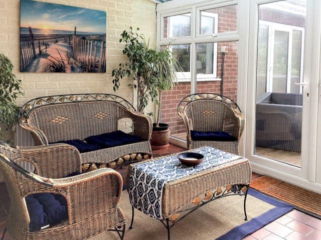 Seating area in the conservatory | Carr House, Cayton, Scarborough