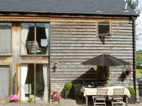 Attractive wooden cladded holiday home | The Barn at Titley, Titley, near Kington