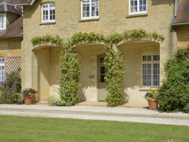 Elegant arched entrance | Sandown - Bruern Holiday Cottages, Bruern, near Chipping Norton