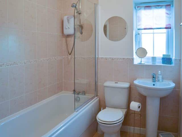 House bathroom with shower over bath | Puffin Place, Beadnell, near Seahouses