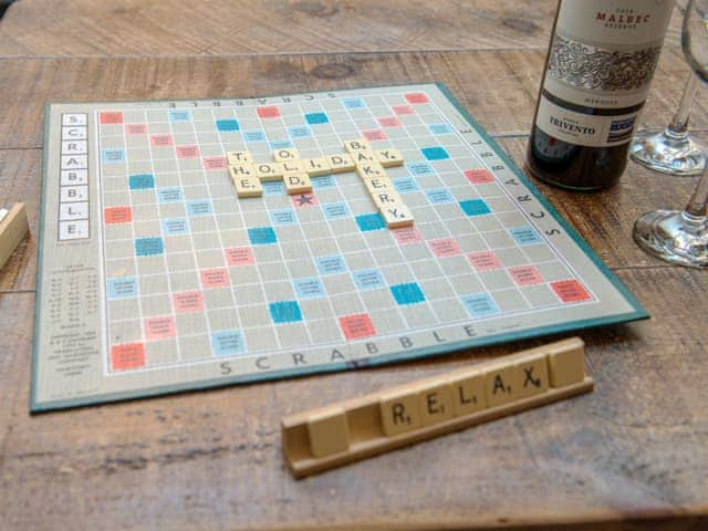 Board games in the relaxing living area | The Old Bakery, Whitby