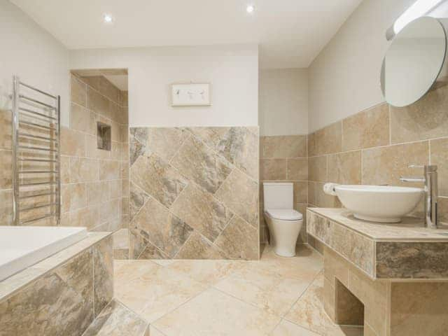 Bathroom, with bath, walk-in shower and toilet | The Old Bakery, Whitby