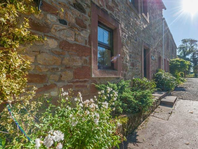 Lovely cottage with floral decorations | Helm Cottage - Milburn Grange, Knock, near Appleby-in-Westmorland