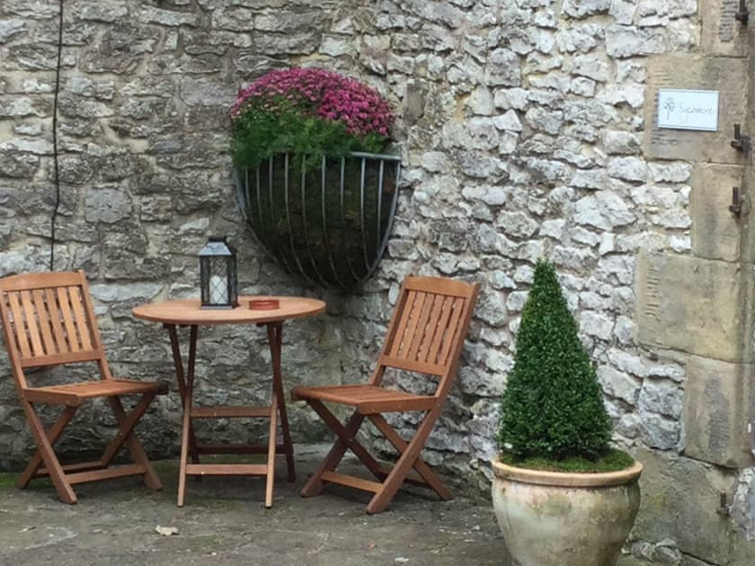 Outdoor seating area near to property entrance | Rabbit Hutch, Over Haddon, near Bakewell