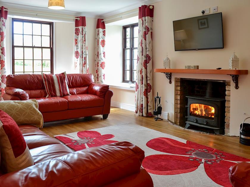 Living room | The Farm House - Lower North Radworthy Cottages, Heasley Mill, near South Molton