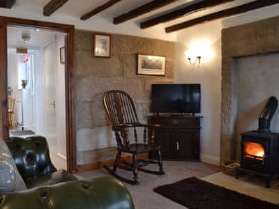 Cosy living room with wood burner | Wild Flower Cottage, Youlgreave, near Bakewell