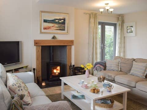 Good size living room with wood burner | Windsmoor Cottage on Gower, Perriswood, near Oxwich