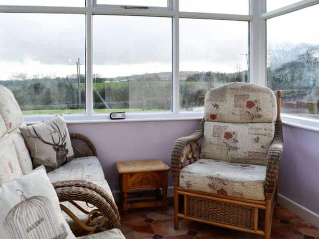 Cosy seating area | Merryview Bungalow, Orcop, near Hereford