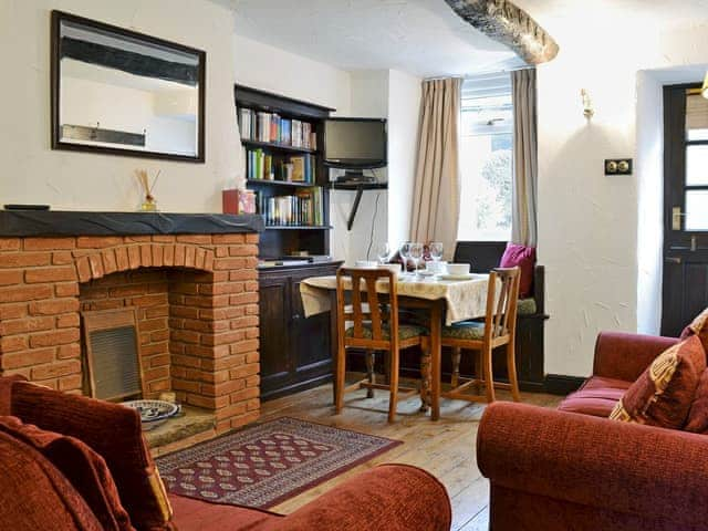 Warm and welcoming living room with beams | Michill Cottage, Castleton, near Buxton