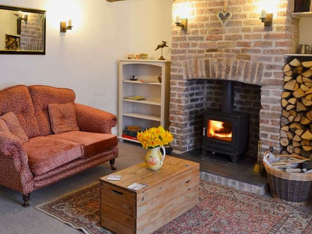 Comfortable living room with wood burner | The Cottage, Broadstairs