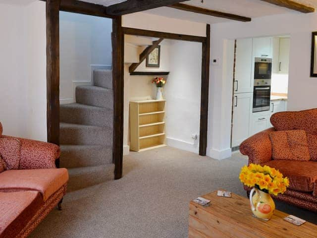 Comfortable living room with wood burner | The Cottage, Broadstairs