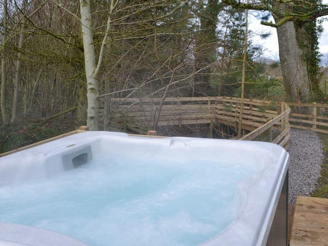 Welcoming private hot tub | Treehouse Cabin - Wallace Lane Farm Cottages, Brocklebank, near Caldbeck and Uldale