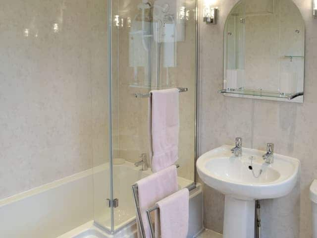 Family bathroom with shower over bath | Birch Cottage - Whitelee Farm, Bryness, near Otterburn