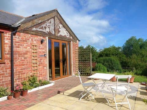 Attractive holiday home with spacious patio | Spindlestone - Wide Sky Cottages, Lowick, near Berwick-on-Tweed