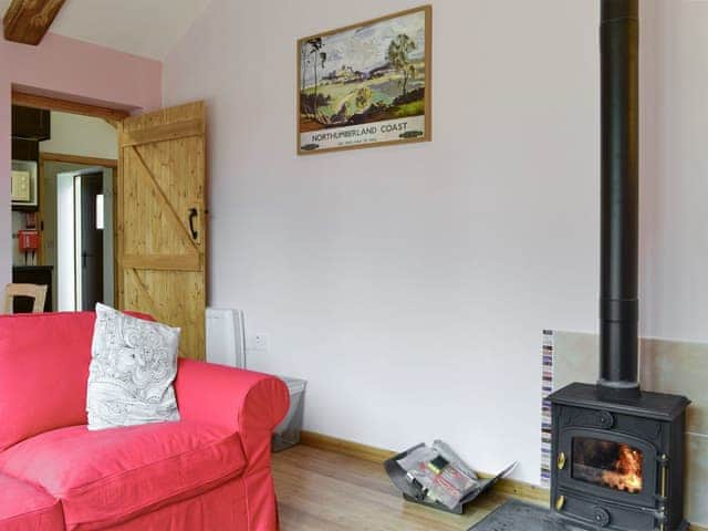 Wood burner in living and dining room | Spindlestone - Wide Sky Cottages, Lowick, near Berwick-on-Tweed