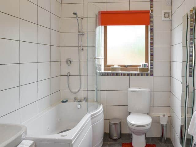 Bathroom with shower over bath | Spindlestone - Wide Sky Cottages, Lowick, near Berwick-on-Tweed